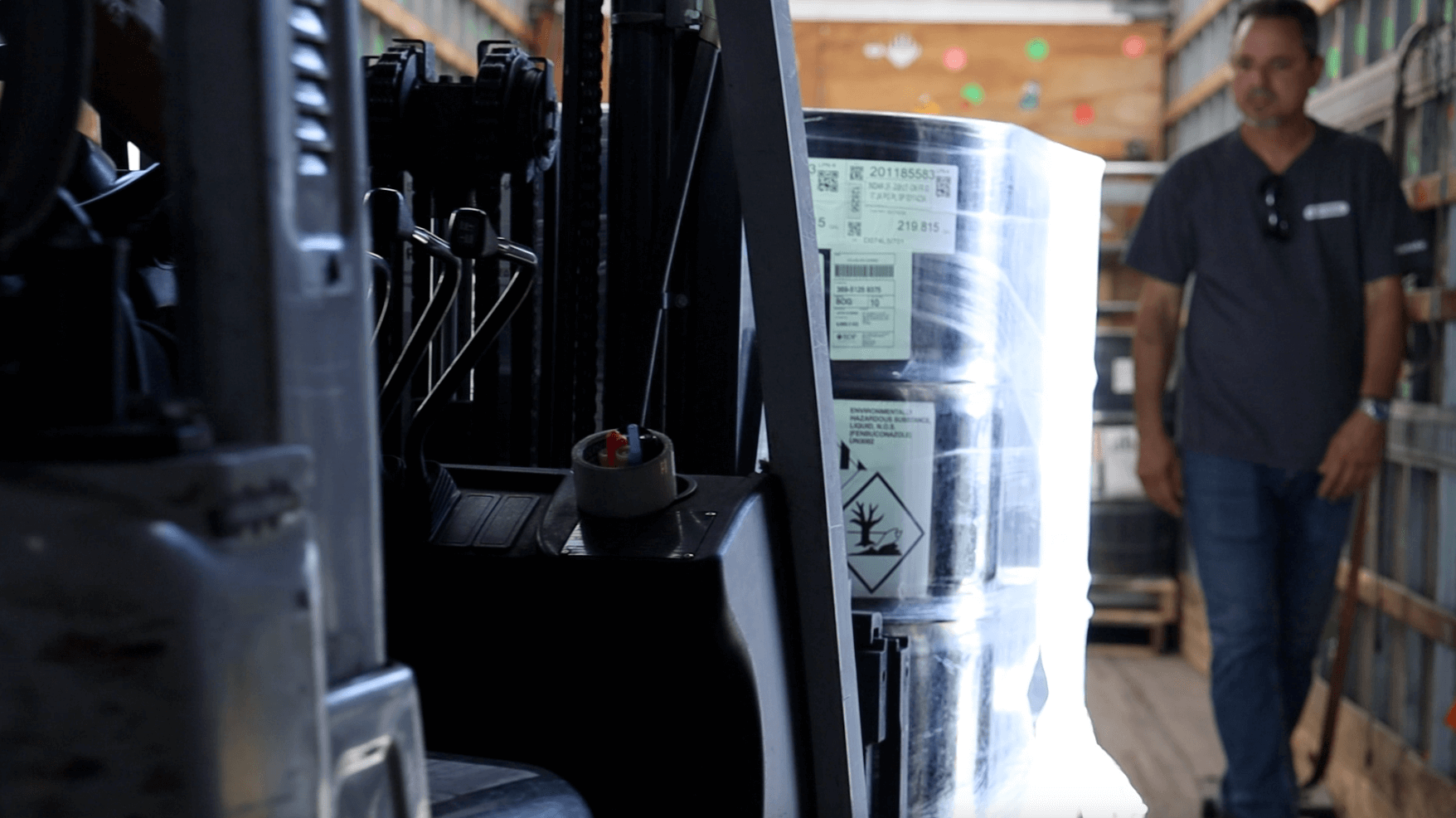 Forklift loading truck with hazmat materials