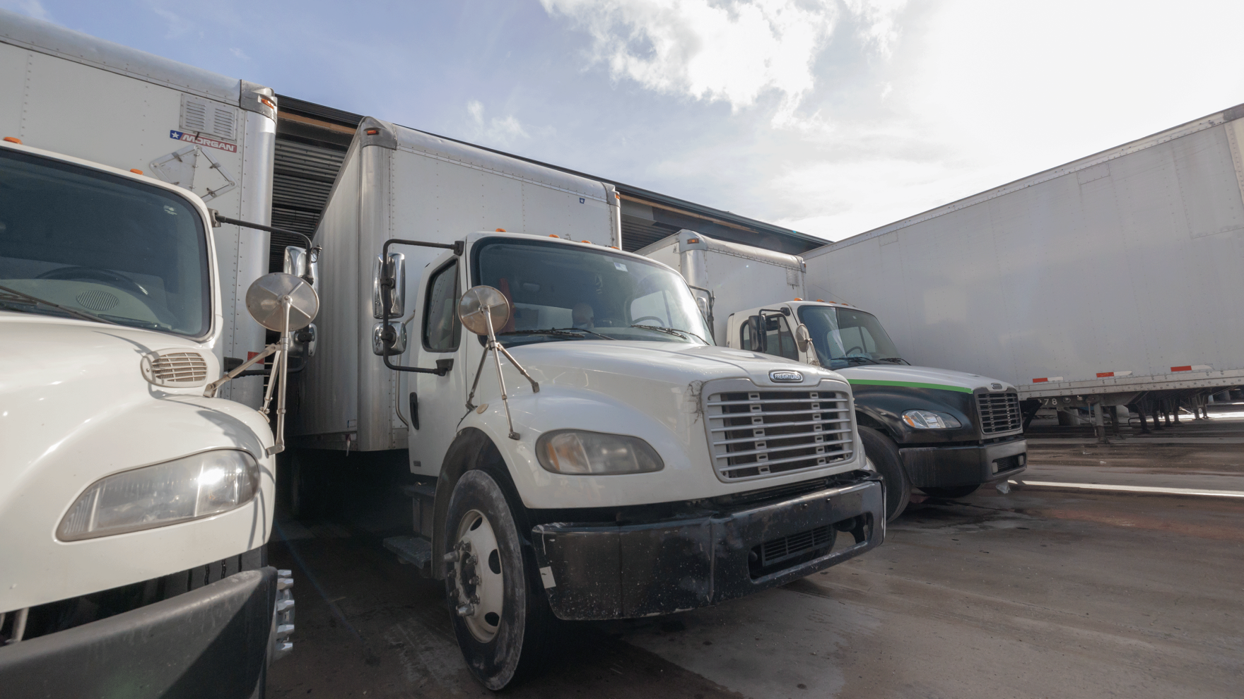 Trucks parked at warehouse dock