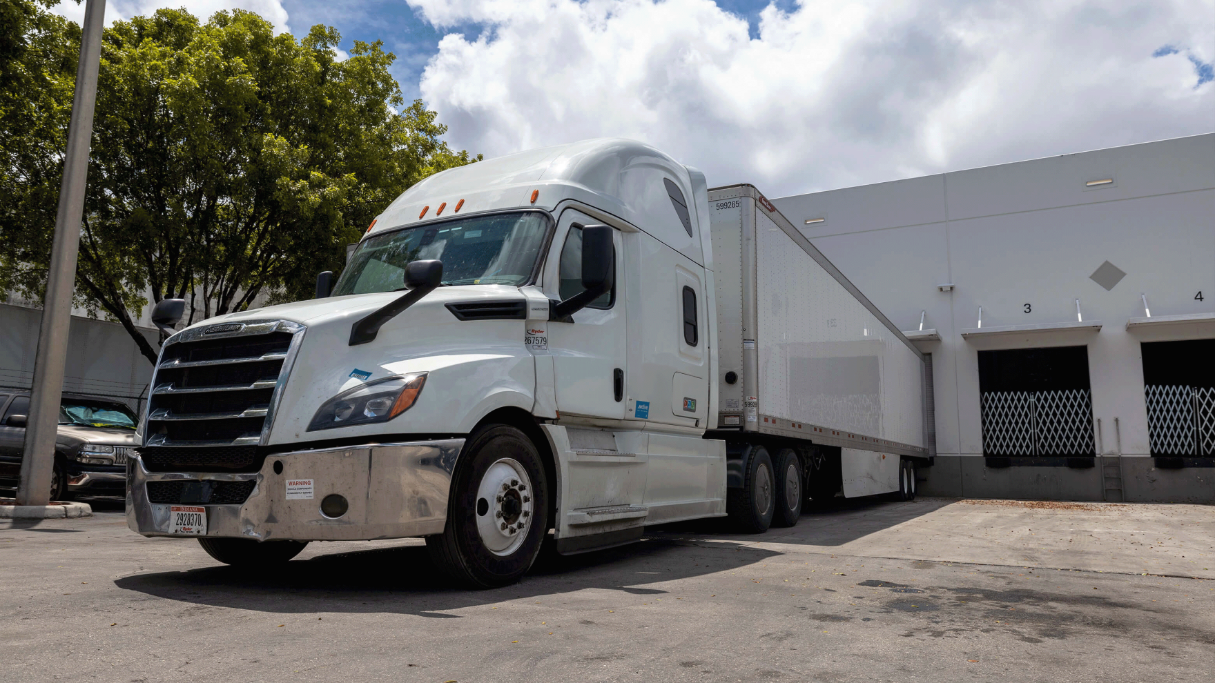 FTL truck parked at warehouse dock